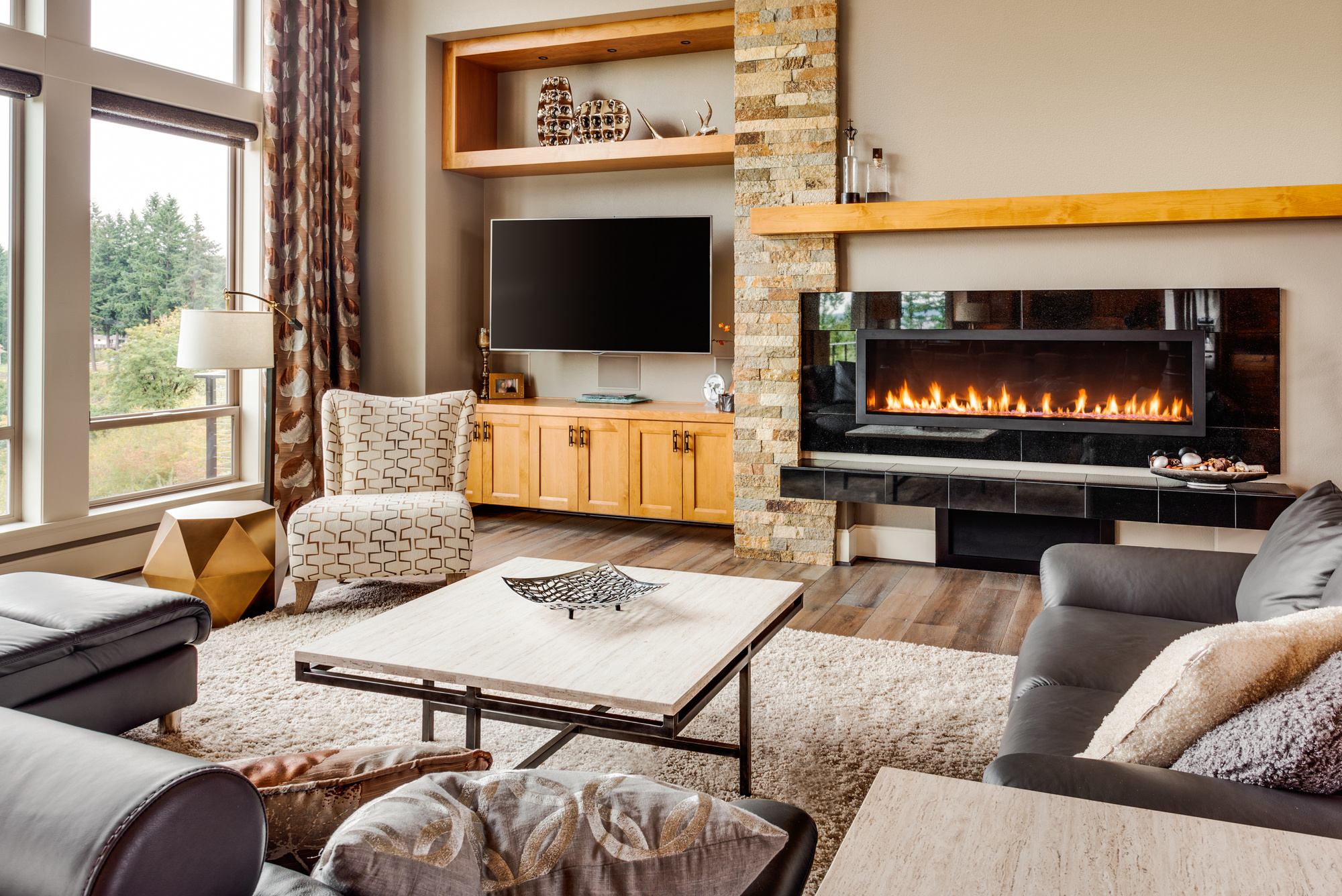 Living Room in Luxury Home with Fireplace and TV